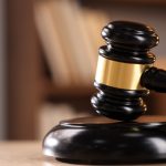 Bărbați, judecați pentru violul de la Școala de vară AUR din septembrie