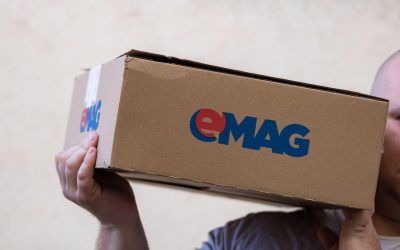 EMAG introduce o taxă nouă: Cumpărătorii plătesc mai mult pentru comenzi