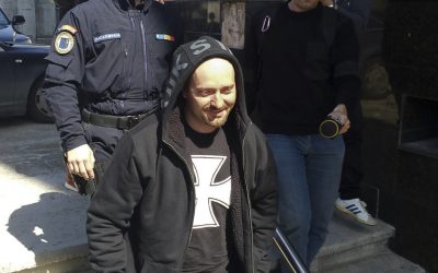 Cheloo, încătușat și dus la spital de poliție